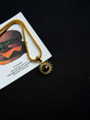 Gold Sunburst Pendant Necklace with Cat’s Eye Stone