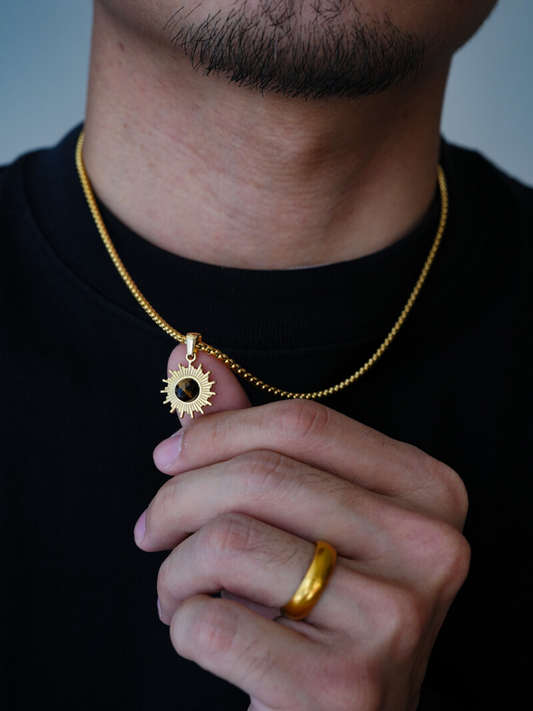 Gold Sunburst Pendant Necklace with Cat’s Eye Stone