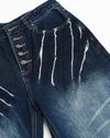 Distressed Claw Patch Jeans – Washed Blue-Black Blade Cut